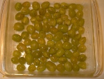 A pound of gooseberries in a 9" x 9" baking dish