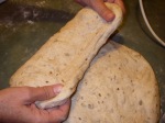 Fold the dough over the center.