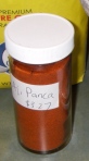 A jar of aji panca powder from Christina's